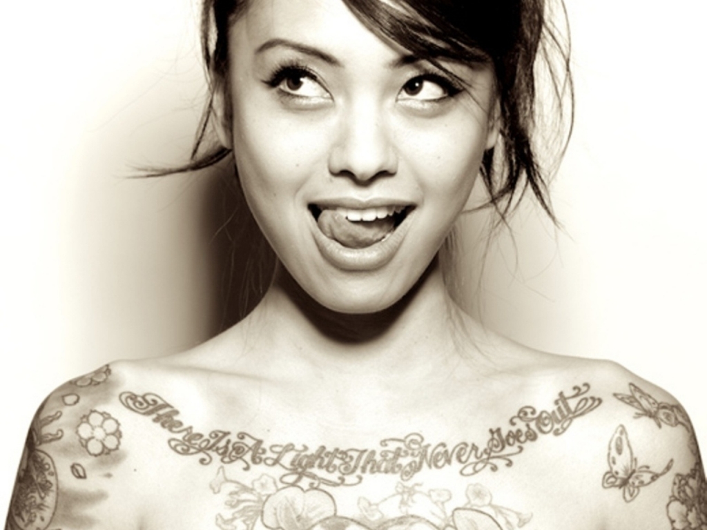 Levy Tran boob job facelift lips