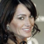 Nadia Comaneci botox body measurements boob job